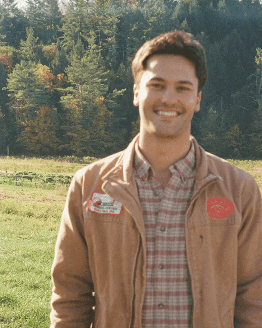 Tommy, Ambrook Customer Success team member, with a rancher and horse in California